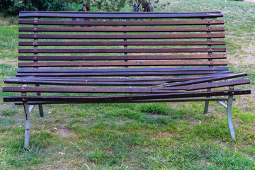 Broken garden/lawn furniture made of wood seen in the streets of Copenhagen. Seemed like leftovers...