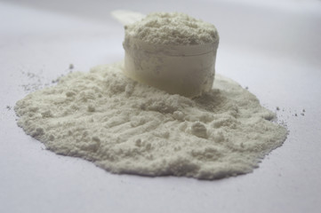 Placer of creatine and flour in the kitchen, isolated