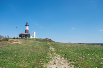 Fototapeta na wymiar Lighthouse at the shore