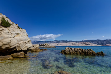 Fototapeta na wymiar Rocky beach at the island of Pag, Croatia