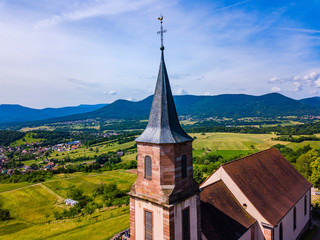 Fototapeta na wymiar Aerial view of Church Saint-Gilles in Saint-Pierre-Bois, Alsace