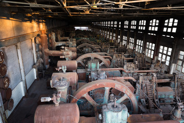 Fototapeta na wymiar Old Rusty Steel Building Machinery in Bethlehem Steel Stacks showing industry and work industrial engineering