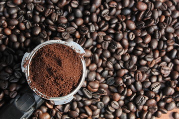 Full coffee dispenser on coffee beans.