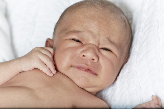 Close up of Infant starting to Cry
