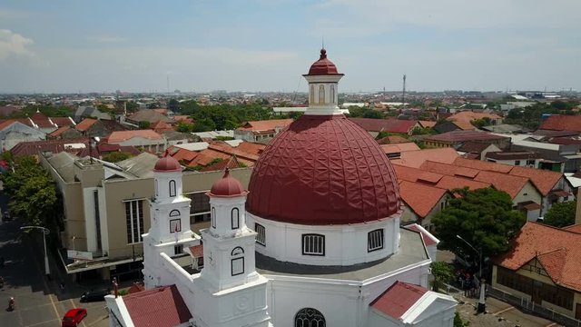 Slow drone shot of Blenduk church in Dutch colonial district in Semarang, architecture religion history Indonesia