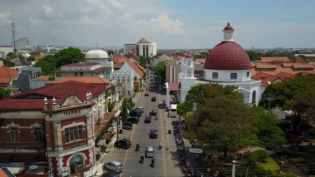 Aerial view of partly restored Dutch East Indies colonial neighborhood and church in Semarang, history and tourism Indonesia