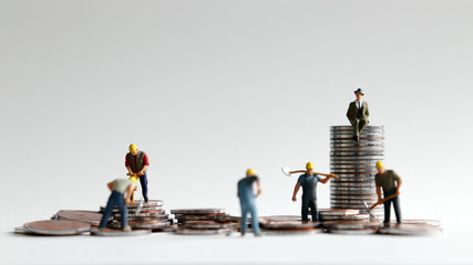 The concept of differences between hard-working workers and employers to make money....