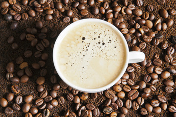 A cup of strong frothy espresso coffee