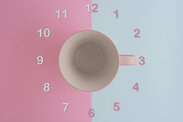 Coffee cup and clock number around the cup with cup holder point to number 3 for coffee time concept