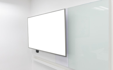 Mock up of LED TV installed to the white wall of the meeting room with white board