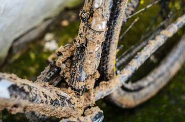 Fototapeta na wymiar Bottom Bracket Area of Dirty Mountain Bike After the Race