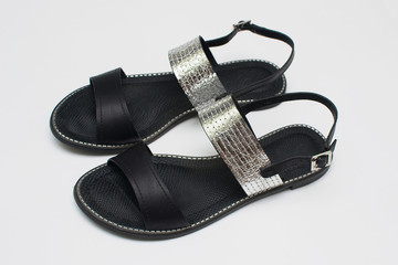 
black women's sandals. Summer shoes on a white background