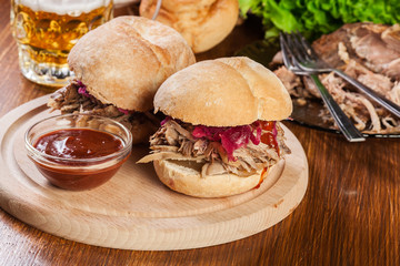 Pulled pork sandwich with red cabbage and bbq sauce