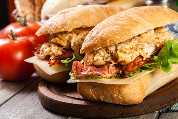 Ciabatta sandwich with smoked bacon and eggs