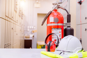Fire extinguisher in control room,Standard safety equipment.