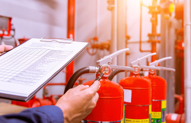 Engineer checking Industrial fire control system,Fire Alarm controller, Fire notifier, Anti...