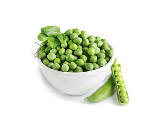 Bowl with delicious fresh green peas on white background