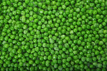 Frozen peas as background, top view. Vegetable preservation