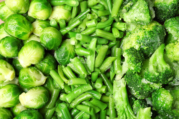 Mix of frozen vegetables as background, top view