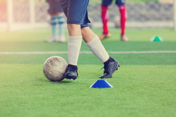Kid soccer trap and control the soccer ball