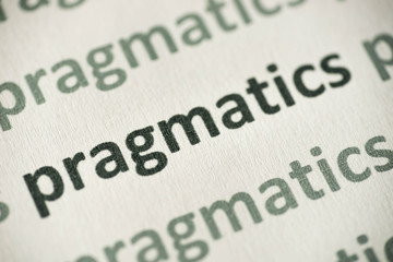 word pragmatics  printed on paper macro