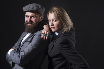 Couple detectives investigators partners. Partnership clever intelligent reporter investigator. Man and blonde woman dressed formal old fashioned. Private detective couples in books and film