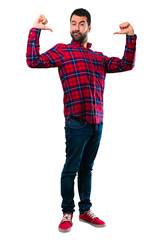 Naklejka premium Handsome man proud and self-satisfied in love yourself concept