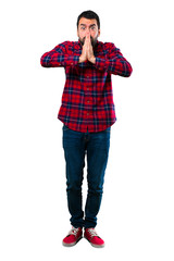 Handsome man pleading for something