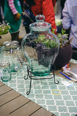 decor objects garden interiors. glass jar with a tap for drinks
