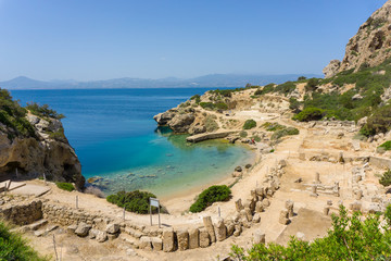 Fototapeta na wymiar Small beautiful beach at archaeological site of Heraion, sanctuary of goddess Hera, in Perachora, Loutraki, Greece