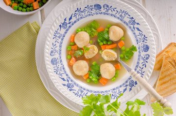 Fresh vegetable soup with chicken dumplings