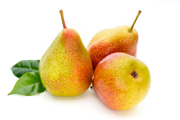 Fresh bio pear with leaves on isolated white background.