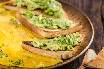 Egg omelette with garlic avocado toast