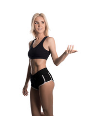 Obraz premium Sporty blonde in sexy top and shorts isolated view