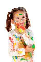 Funny girl with hands and face full of paint