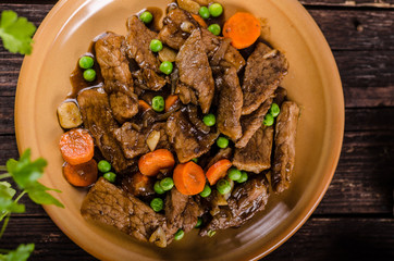 Pork medallions with vegetable and soy garlic sauce