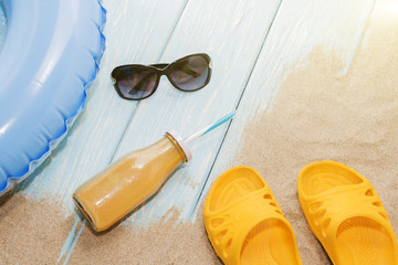 summer vacation on the beach. Yellow flip-flops and swimming laps.