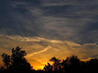 Fototapeta premium early summer sunset with clouds