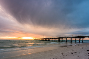 Fototapeta premium Stormy sunset at Seaford Pier