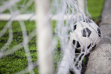 Football bounce is behind the goal line