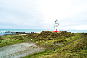 Fototapeta na wymiar Waipapa point, the lighthouse, ocean and cloudy.