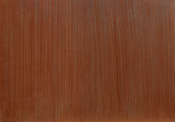 Natural bordoux plaster background with abstract pattern, close-up, macro.