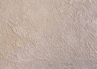 Beige rough wall textured background. Abstact stucco. Texture of plaster on the wall.