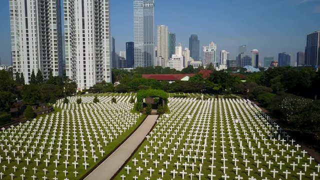 Flying over Dutch war memorial graveyard Menteng Pulo in Jakarta, Indonesia
