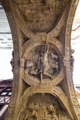 View looking up at the underside of the Gros Horloge in Normandy. The carved relief celebrates the...