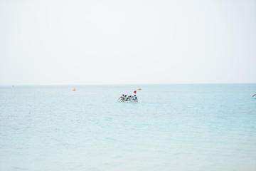traditional boat and white beach in Okinawa Japan, morning relaxing