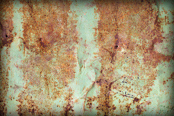 Rusty painted iron as a background.