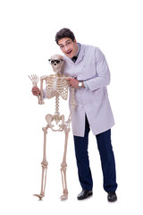 Naklejka premium Young doctor with skeleton isolated on white