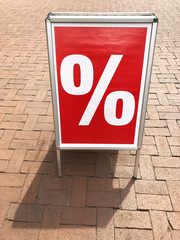 customer stopper sign board advertising sale with percent symbol