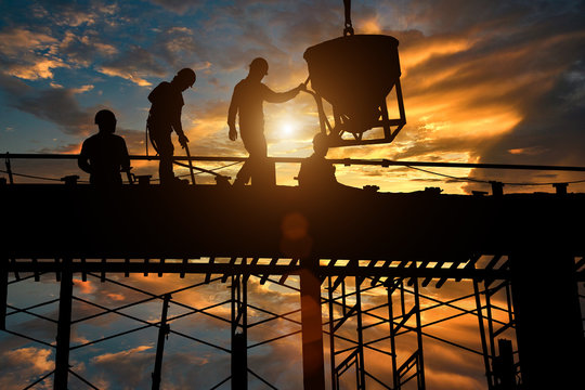 Labor Day Commands Silhouette engineers stand for construction teams to work in heavy industry, high ground and safety concepts over natural color pencils that blur the background.